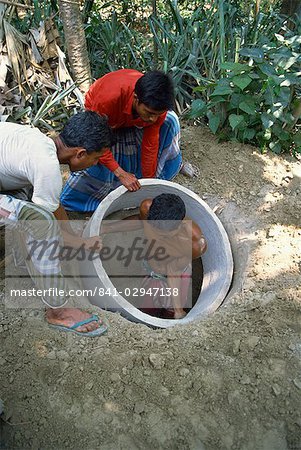 Constructing latrines, Bangladesh, Asia
