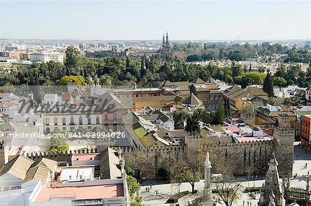 Real Alcazar, UNESCO World Heritage Site, viewed from the tower of La Giralda, Santa Cruz district, Seville, Andalusia (Andalucia), Spain, Europe Real Alcazar, UNESCO World Heritage Site, viewed from the tower of La Giralda, Santa Cruz district, Seville, Andalusia (Andalucia), Spain, Europe