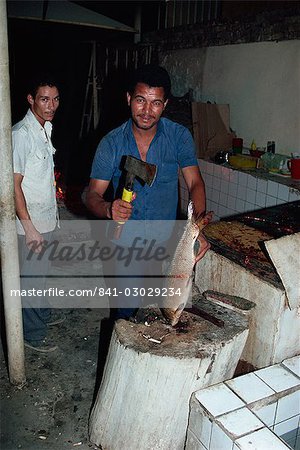 Portrait of man preparing Mazgouf fish, Abu Nawas street market, Baghdad, Iraq, Middle East