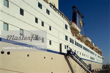 Gangway and ferry ship at Mandraki harbour, on the island of Rhodes, Dodecanese, Greek Islands, Greece, Europe