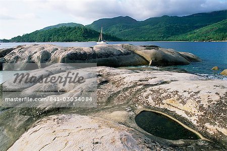 Rocks on coast, Ile Therese (Therese island), northwest coast, island of Mahe, Seychelles, Indian Ocean, Africa