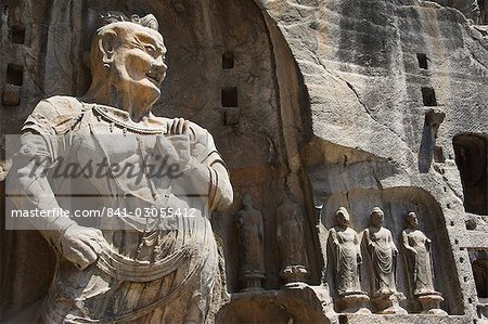 Carved Buddha images at Longmen Caves, Dragon Gate Grottoes dating from between the 6th and 8th centuries, UNESCO World Heritage Site, Henan Province, China, Asia