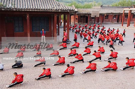 Students exercising and training at Wushu Institute at Tagou Training school for kung fu students, Shaolin Monastery, Shaolin, birthplace of Kung Fu martial art, Henan Province, China, Asia