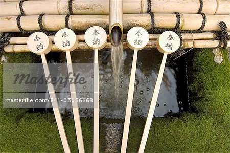 Water ladles, shaku, Nishiki Tenmangu shrine, Kyoto city, Honshu, Japan. Asia