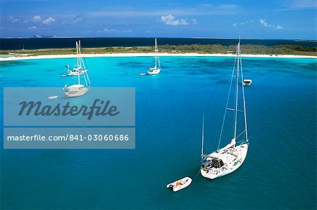 Chaito, sailing boat of the floating village in the foreground, Crasqui, Los Roques, Venezuela, South America