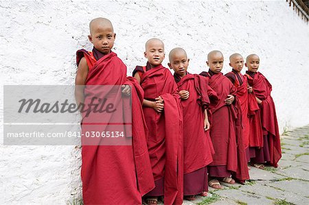 Young Buddhist monks, Karchu Dratsang Monastery, Bumthang, Bhutan, Asia
