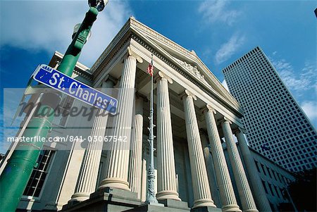 Street sign and colonnaded building on St. Charles Avenue in the French Quarter of New Orleans, Louisiana, United States of America, North America Street sign and colonnaded building on St. Charles Avenue in the French Quarter of New Orleans, Louisiana, United States of America, North America