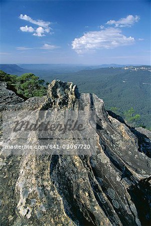 View from limestone pavement across the Jamison Valley in the Blue Mountains National Park where the blue haze is caused by eucalyptus oil, near Katoomba, UNESCO World Heritage Site, New South Wales (N.S.W.), Australia, Pacific View from limestone pavement across the Jamison Valley in the Blue Mountains National Park where the blue haze is caused by eucalyptus oil, near Katoomba, UNESCO World Heritage Site, New South Wales (N.S.W.), Australia, Pacific