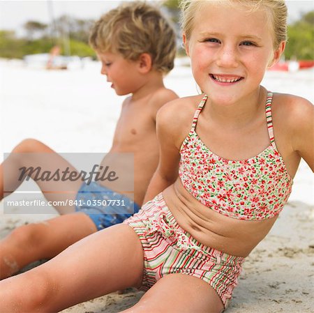 8 years old girl on the beach, Stock Photo, Picture And Rights