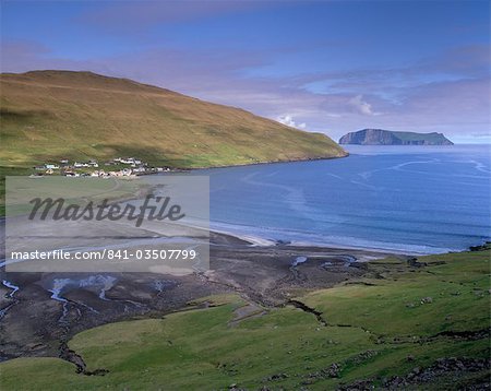 Sandvik illage and bay, Litla Dimun Island in the distance, Suduroy Island, Faroe Islands (Faroes), Denmark, Europe