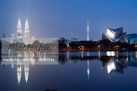 Petronas Towers and Istana Budaya National Theatre, Lake Titiwangsa, Kuala Lumpur, Malaysia, Southeast Asia, Asia