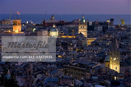 Port and cityscape at dusk, Genoa, Liguria, Italy, Europe