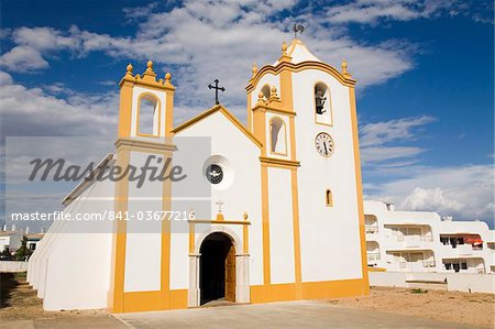 The typically Portuguese white facade of the Nossa Senhora da Luz chuch in Lagos, Algarve, Portugal, Europe