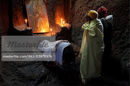 Women praying in Bet Medhane Alem church in Lalibela, Wollo, Ethiopia, Africa