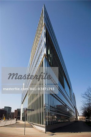 The angular glass fronted modern architecture designed by Hadi Teherani, of the Deichtor Center building, Hamburg, Germany, Europe