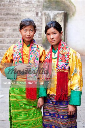 Two young woman in colourful national dress at the Wangdue