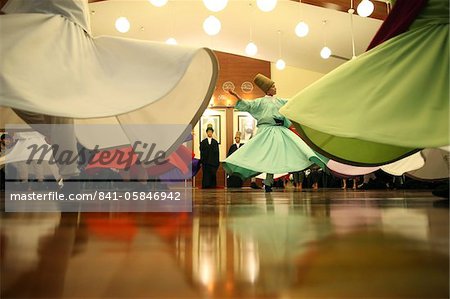 Whirling dervish performance in Silvrikapi Meylana cultural center, Istanbul, Turkey, Europe