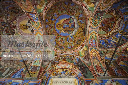 Arcade murals depicting religious figures and scenes, Church of the Nativity, Rila Monastery, UNESCO World Heritage Site, Bulgaria, Europe