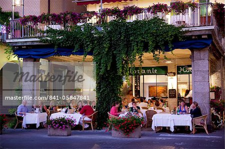 Town restaurant at dusk, Bellagio, Lake Como, Lombardy, Italy, Europe