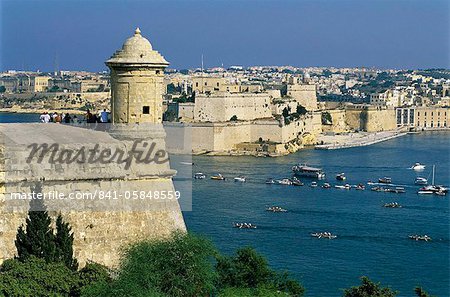 View over Bastions and Grand Harbour to Fort St. Angelo with Rowing Regatta, Valletta, Malta, Mediterranean, Europe