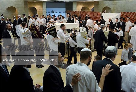 Jews dancing with Torah scrolls, Simhat Torah Jewish Festival, Jerusalem, Israel, Middle East