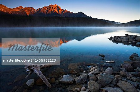 First light on the mountainside over a misty Patricia Lake, Jasper National Park, UNESCO World Heritage Site, Alberta, Rocky Mountains, Canada, North America