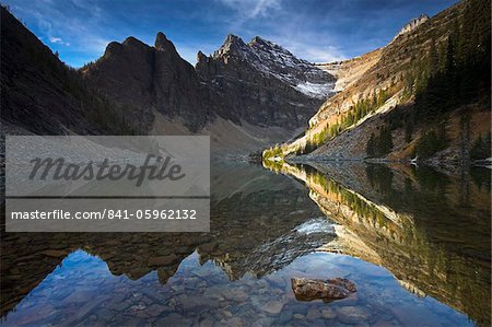 The shallow Lake Agnes captures a perfect reflection of the mountain rang, Banff National Park, UNESCO World Heritage Site, Alberta, Rocky Mountains, Canada, North America