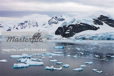 Icebergs, glaciers and mountains at Paradise Harbour, Antarctica, Polar Regions