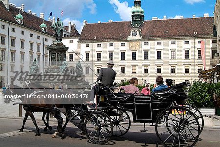 Horse-drawn carriage at the Hofburg, Vienna, Austria, Europe