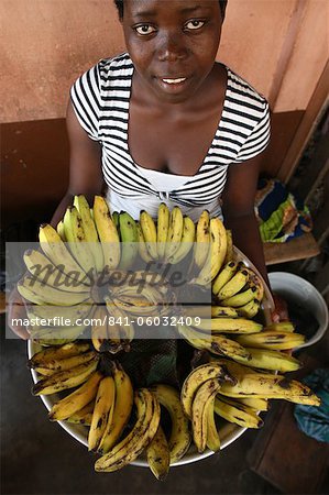 Girl selling bananas, Lome, Togo, West Africa, Africa