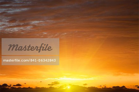 Red sky at sunrise over Atlantic Ocean, view from Miami Beach, Florida, United States of America, North America