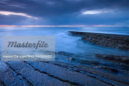 Twilight on the rocky shores of Kilve, Somerset, England, United Kingdom, Europe