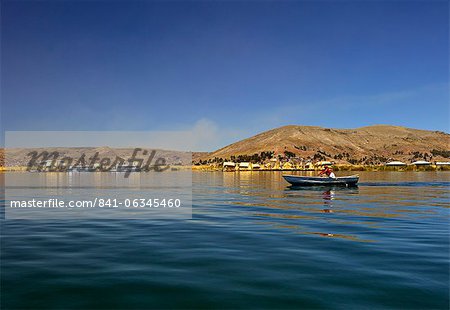Rowing boat, Islas Flotantes, floating islands, Lake Titicaca, Flotantes, peru, peruvian, south america, south american, latin america, latin american South America