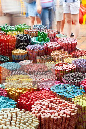 Colourful decorative chopsticks for sale as souvenirs to tourists in Chinatown market, Temple Street, Singapore, Southeast Asia, Asia Colourful decorative chopsticks for sale as souvenirs to tourists in Chinatown market, Temple Street, Singapore, Southeast Asia, Asia