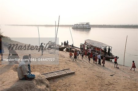 Activity around ferry arrival on the banks of the River Hugli (River Hooghly), rural West Bengal, India, Asia