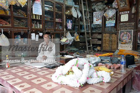 Shop owner in the Kumartuli district of Kolkata, West Bengal, India, Asia