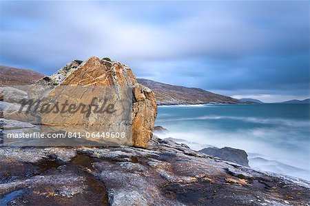 Giant Lewisian gneiss rock on a showery evening at Mealista on the south west coast of Lewis, Isle of Lewis, Outer Hebrides, Scotland, United Kingdom, Europe