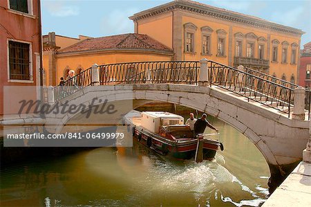 Bridge over canal with goods boat, Venice, UNESCO World Heritage Site, Veneto, Italy, Europe