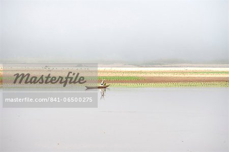 Along Tsiribihina, a river flowing from Madagascar in the Mozambique Channel by a delta, Madagascar, Indian Ocean, Africa Along Tsiribihina, a river flowing from Madagascar in the Mozambique Channel by a delta, Madagascar, Indian Ocean, Africa