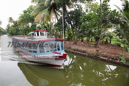 Ferry boat travelling on the Kerala Backwaters, Kerala, India, Asia