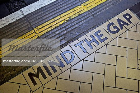 MIND THE GAP sign on platform edge, London Underground, London, England, United Kingdom, Europe