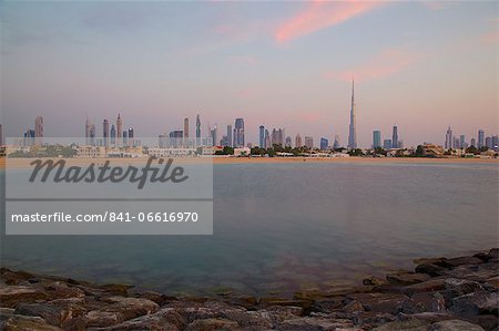 Burj Khalifa and city skyline at sunset, Jumeirah Beach, Dubai, United Arab Emirates, Middle East