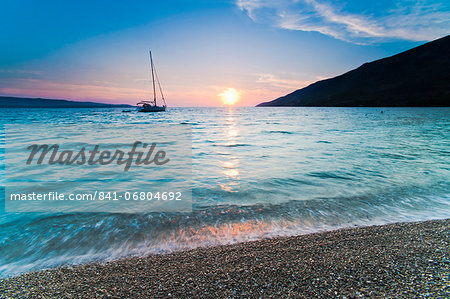 Adriatic Sea off Zlatni Rat Beach at sunset, Bol, Brac Island, Dalmatian Coast, Croatia, Europe