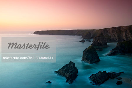 A view of the Bedruthan Steps at dusk, Cornwall, England, United Kingdom, Europe