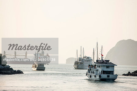 Shipping in Halong Bay, UNESCO World Heritage Site, Vietnam, Indochina, Southeast Asia, Asia