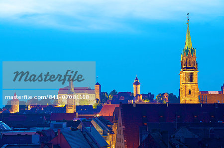 View over city at sunset with St. Lorenz, St. Sebald and the Castle in the background, Nuremberg, Bavaria, Germany, Europe