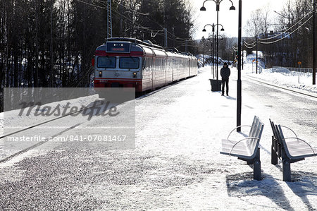 Suburban commuter train arriving at Vakas station near Oslo, Norway, Scandinavia, Europe