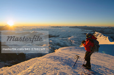 Climber on summit of Mont Blanc, Chamonix, Haute-Savoie, French Alps, France, Europe