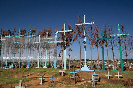 A Series Of Tall Crosses At The Crest Of The Graveyard