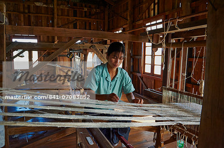 Burmese woman at loom, Nampan village, Inle Lake, Shan State, Myanmar (Burma), Asia